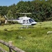Craig Charles arriving at The Oak Inn by helicopter