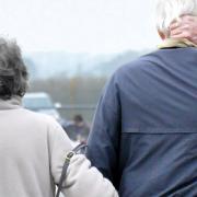 A carer fleeced an elderly Herefordshire couple out of thousands of pounds