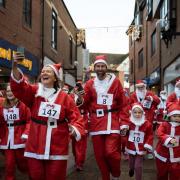 Santas, young and old, set off down Gomond Street
