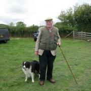 Mr Beris Mason of Newbridge on Wye with one of his dogs, Spot.