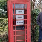 Hereford Times reporter Paul Rogers next to the 'James Blunt Museum'