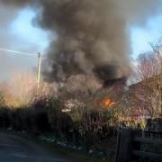 A shed and garage caught fire in Belmont, Hereford