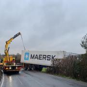 A lorry is recovered after leaving the A417 near Ashperton