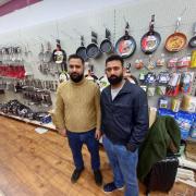 Sushil Kumar (left) and Zulfiqar Hussain in the shop