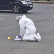 EVIDENCE: Forensics teams at the Pear Tree Inn and Country Hotel in Smite in Worcester