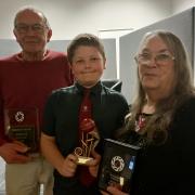 The Herbert family (from left), Graham, Noah and Jan, with their awards.