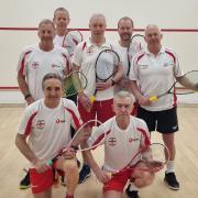 Tom Burton (back row middle) was captain of the England squash masters men’s over-65 team