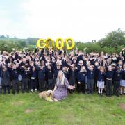 Children and staff at Peterchurch Primary School celebrate after receiving a 'good' Ofsted report