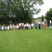 Above: Spelling it out, youngsters from Shobdon’s Arches Preschool take part in their relay event.