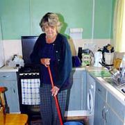 Vanessa Jones cleans up after sewage flooded her home in Leominster. Picture by David Griffiths