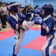 The Combat Academy's Karate Team William Richards on Left on the road to gold