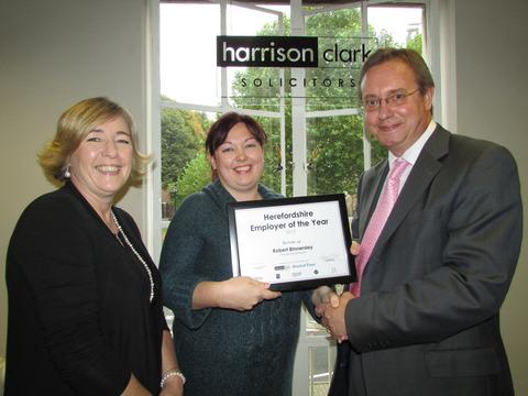 Kate Hoskins (centre), dental nurse of St Martin's Dental Practice, receives the runners-up award on behalf of Robert Binnersley of St Martin's Dental Practice. She is seen with Hereford Times editor Fiona Phillips and Richard Morgan of Harrison Clark. 