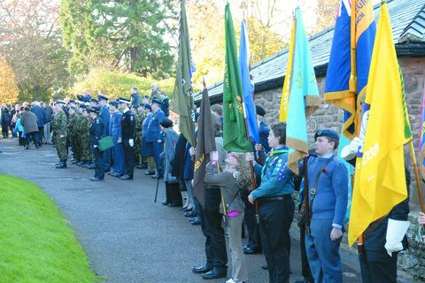 The parade lines up outside St Mary's Church in Ross-on-Wye during the Remembrance service. Picture by Eye Contact Media.