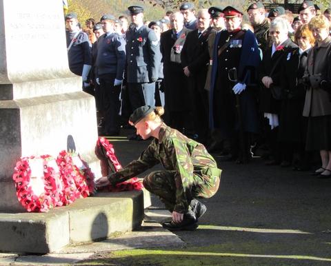 Army cadet Kylish Jones lays a wreath in memory of William Aldridge. Picture by Mark  Bowen.