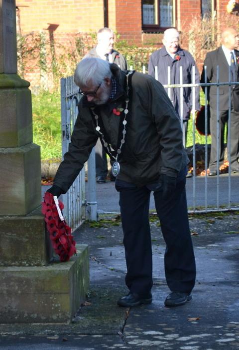 Mayor of Presteigne and Norton Brian Price laying the council wreath. Picture by Jane Bywater.