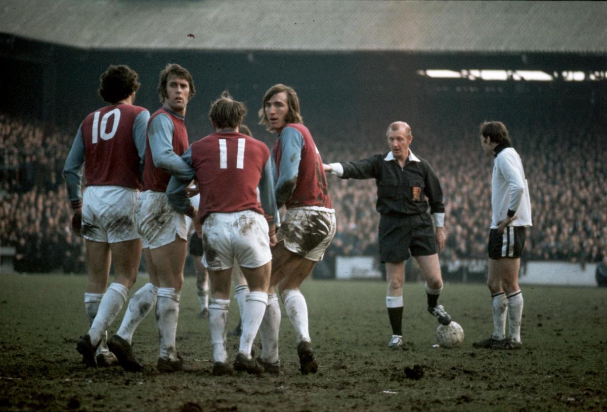 A worried-looking West Ham wall including Trevor Brooking, Geoff Hurst & Billy Bonds prepare to face a Ronnie Radford free-kick in the FA Cup Fourth Round replay.
