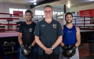 Vince McNally (middle) believes boxing gyms are very beneficial in communities