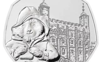 Released by the Royal Mint in 2019, the coin features Paddington standing outside the Tower of London