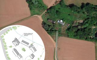 an aerial view of the farm buildings and proposed layout of the replacement houses