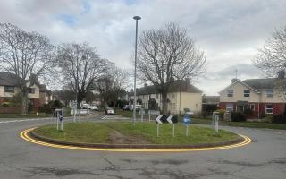 This roundabout has been given double yellow lines