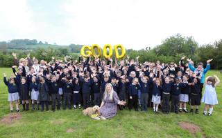 Children and staff at Peterchurch Primary School celebrate after receiving a 'good' Ofsted report