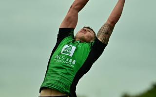 Archie Benson reaches high to claim the ball for Luctonians during a standout campaign