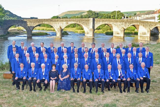 Builth Male Voice Choir  in front of the bridge at Builth Wells