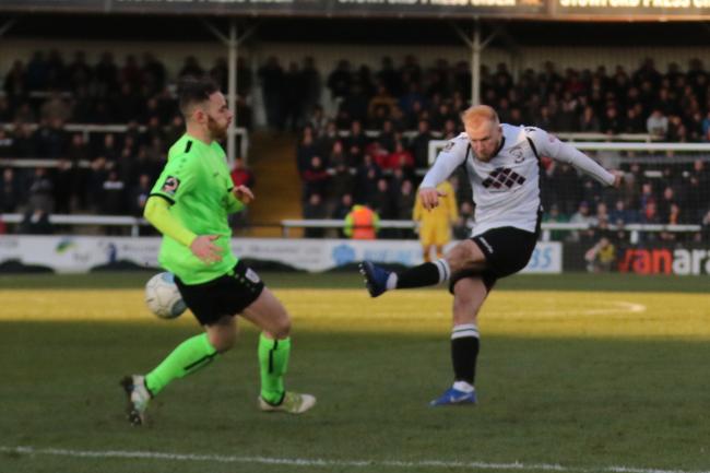Danny Greenslade scores the opening goal against Curzon Ashton. Picture: Steve Niblett/Hereford FC